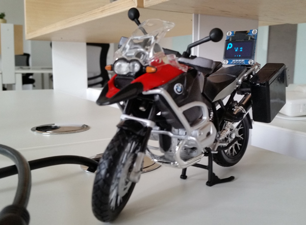 Office Status mounted on motorcycle toy